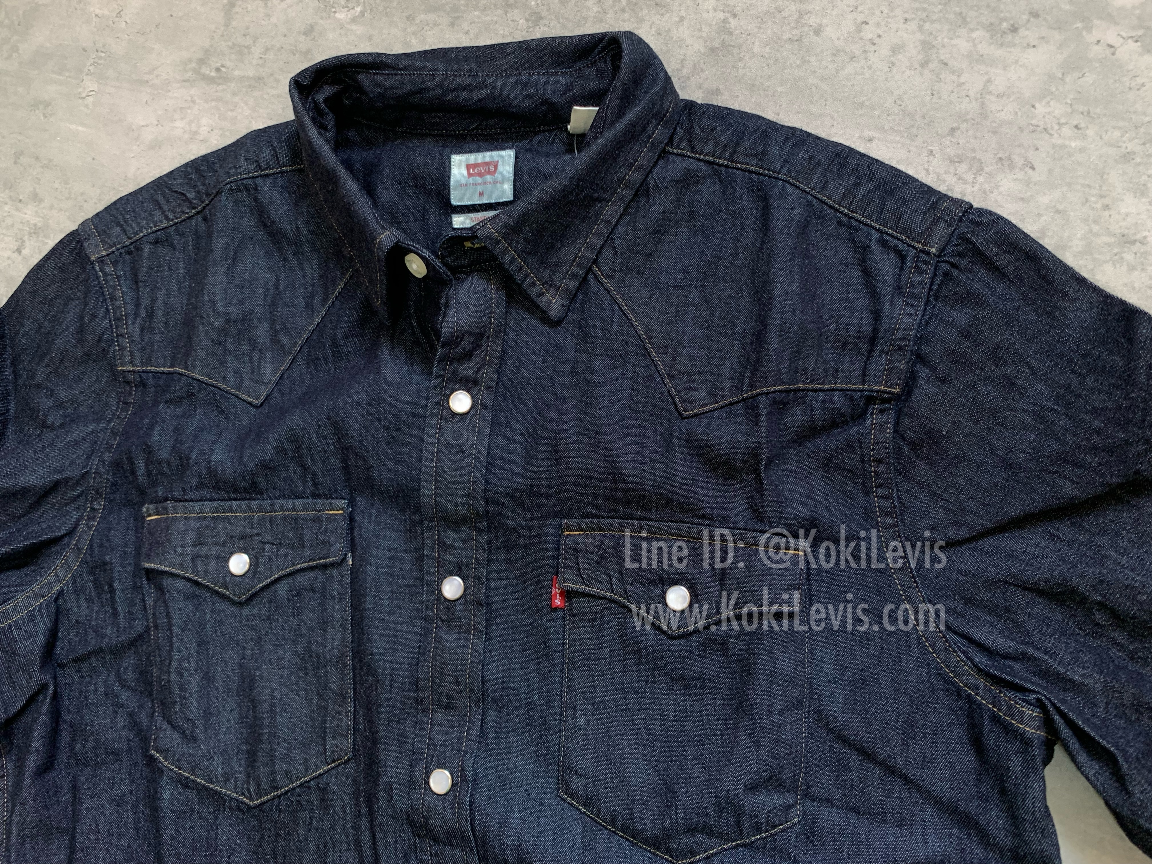 เสื้อเชิ้ตกระดุมมุก